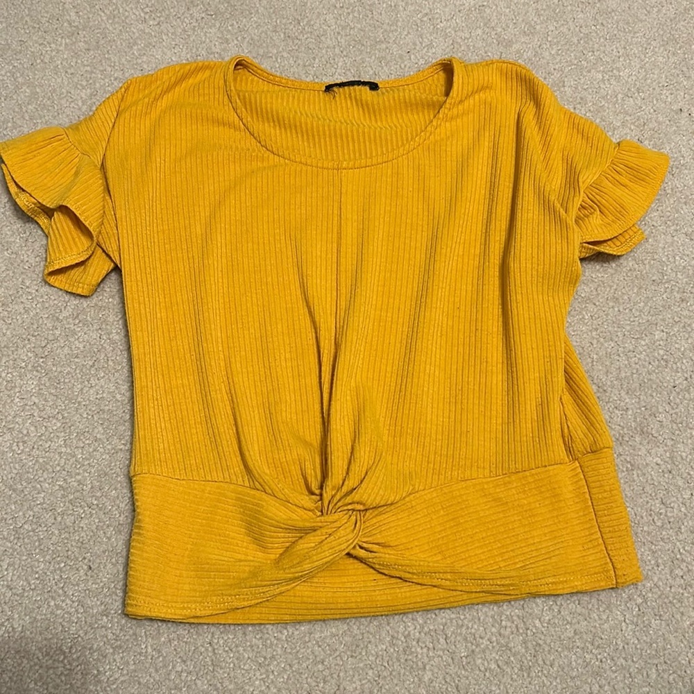 Top with knot at the bottom